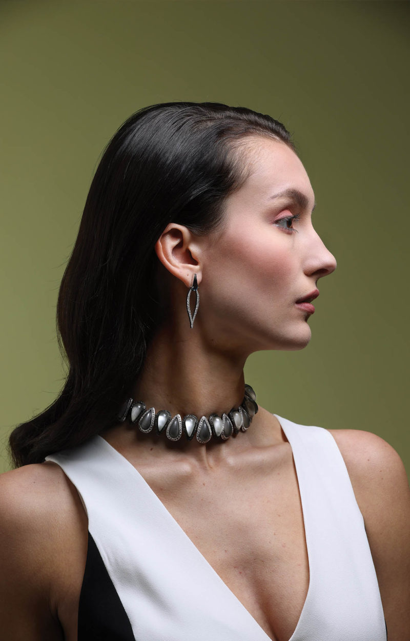 Diamond drop earrings, $6,525. From Hale’s Jewelers; replica necklace, $895. From Coleman Collection; alice + olivia by Stacey Bendet Tessa jumpsuit, $440. From Monkee’s of the West End.