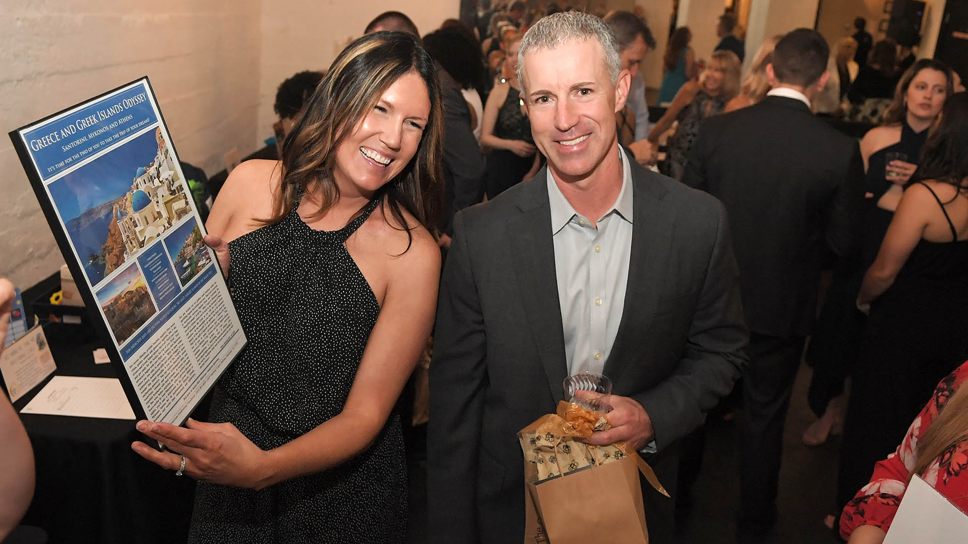 Susan and Brain Mullins outbid for the Greek Islands Vacation. AID-L hosted their Spring Gala, May 13, 2022.