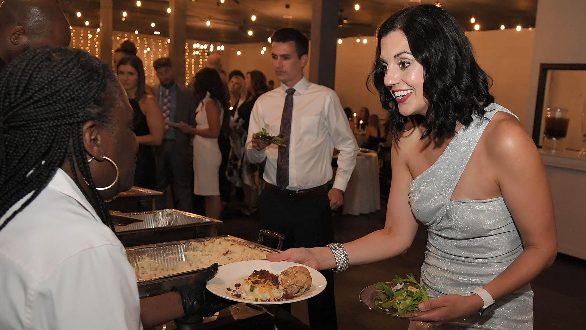 Claire Gutbrod enjoys Dinner. AID-L hosted their Spring Gala, May 13, 2022.