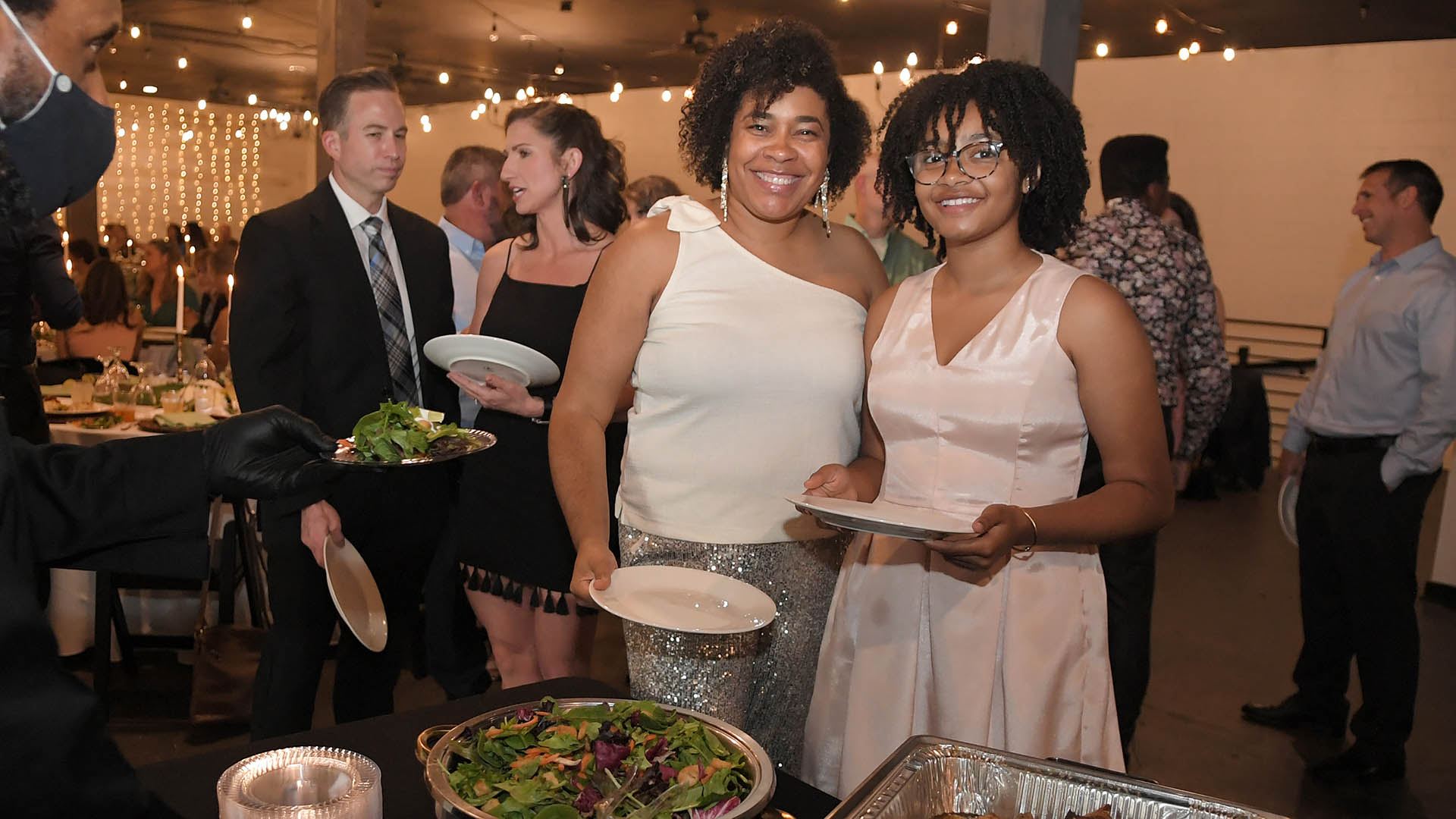 Blaire Campbell and Charli Meadows enjoy dinner. AID-L hosted their Spring Gala, May 13, 2022.