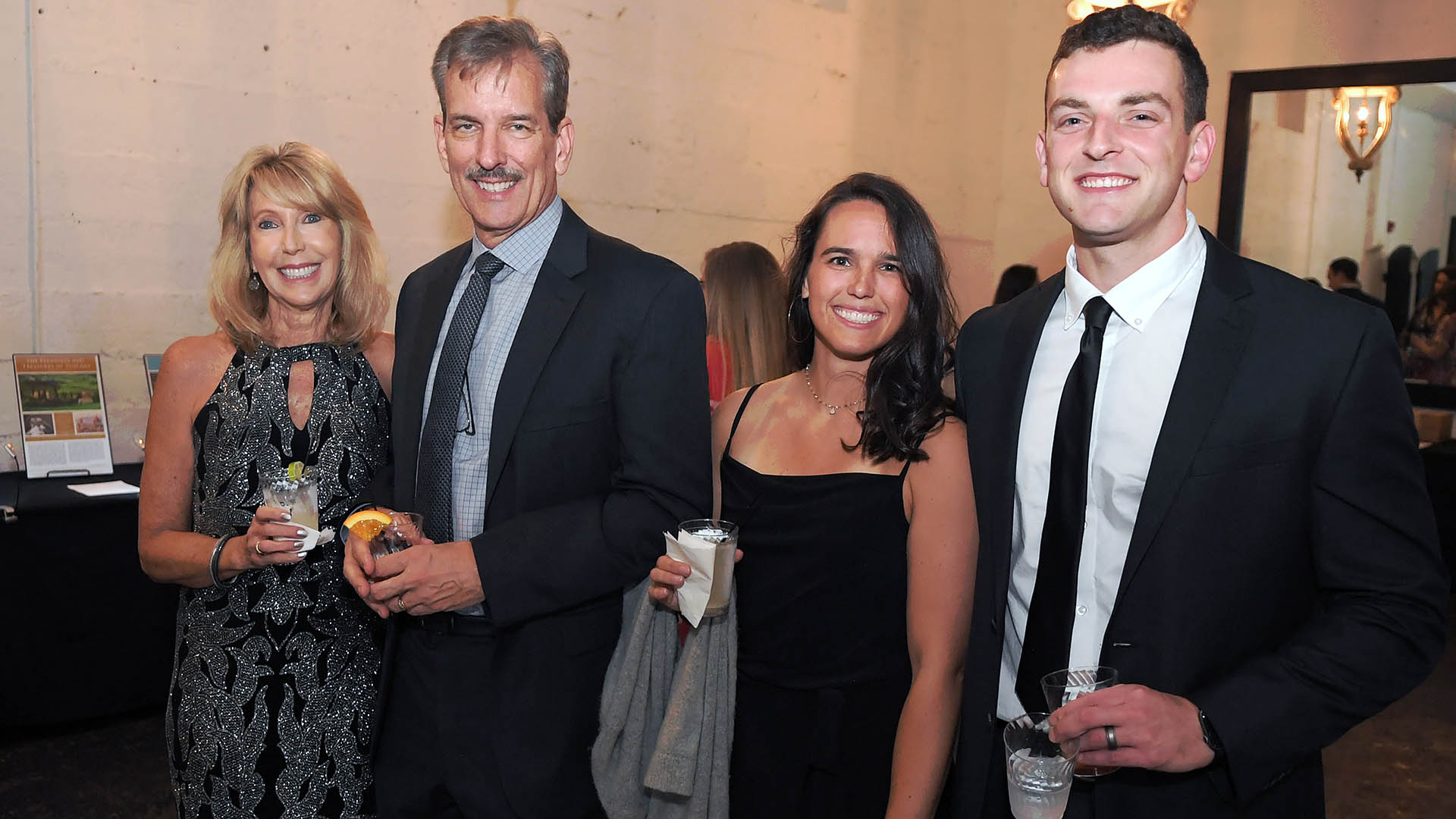 Lori and Greg Martin, Tara and will Shingleton enjoy the evening. AID-L hosted their Spring Gala, May 13, 2022.