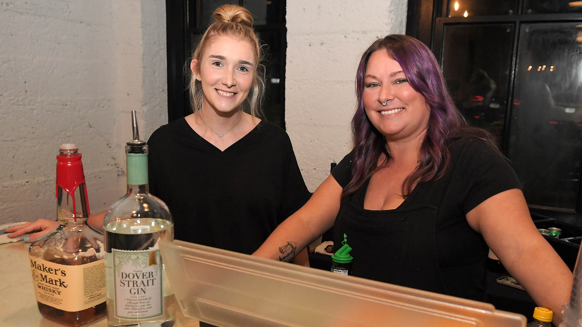 Bridgette Gay and Rebecca Nix work the Bar. AID-L hosted their Spring Gala, May 13, 2022.