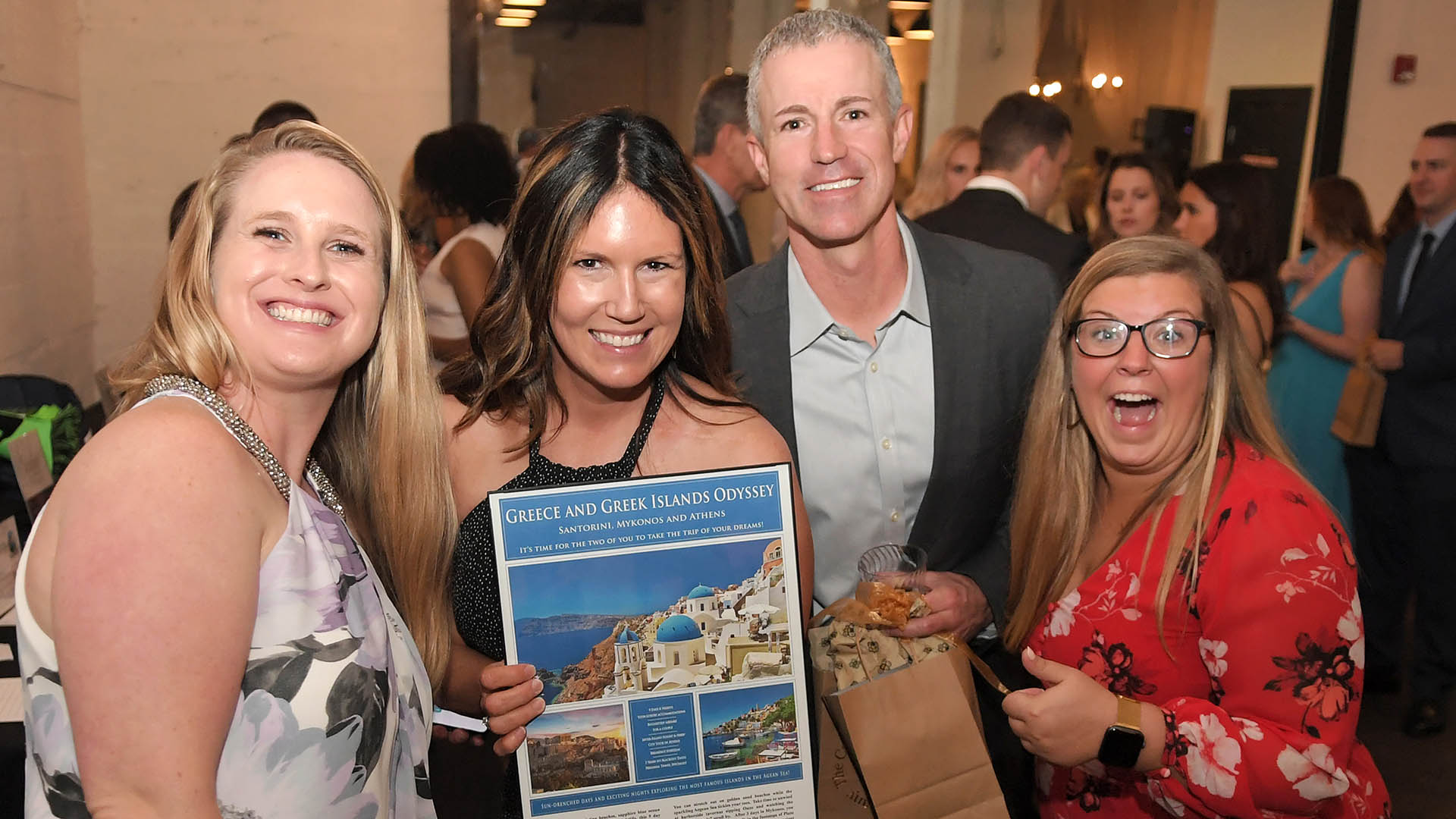 Samantha Grimm, Susan and Brian Mullins, and Meagan Jarvis enjoy the evening and the Silent Auction. AID-L hosted their Spring Gala, May 13, 2022.