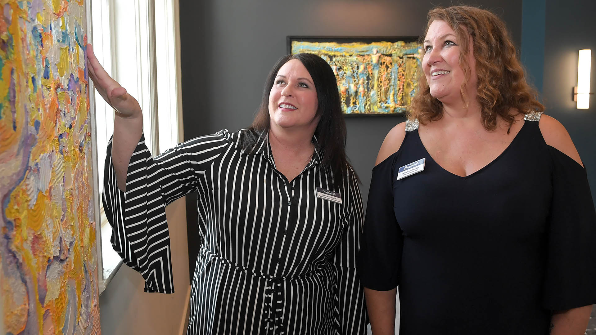 Lisa Everidge and Dianna Gracely enjoy the evening. The Simpsonville Arts Center presented the Ed Cascone Art Exhibition Tuesday, August 2, 2022. GWINN DAVIS MEDIA