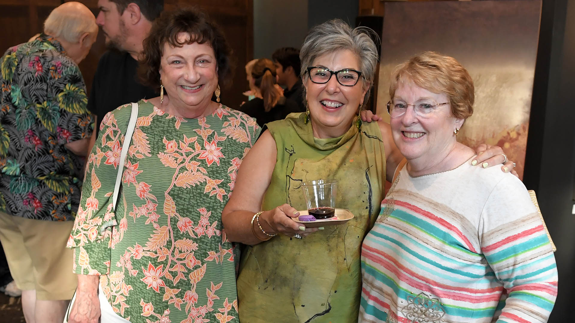 Ann Isidoridy, left, Lisa Briganti and Betsy McCarthy enjoy the evening. The Simpsonville Arts Center presented the Ed Cascone Art Exhibition