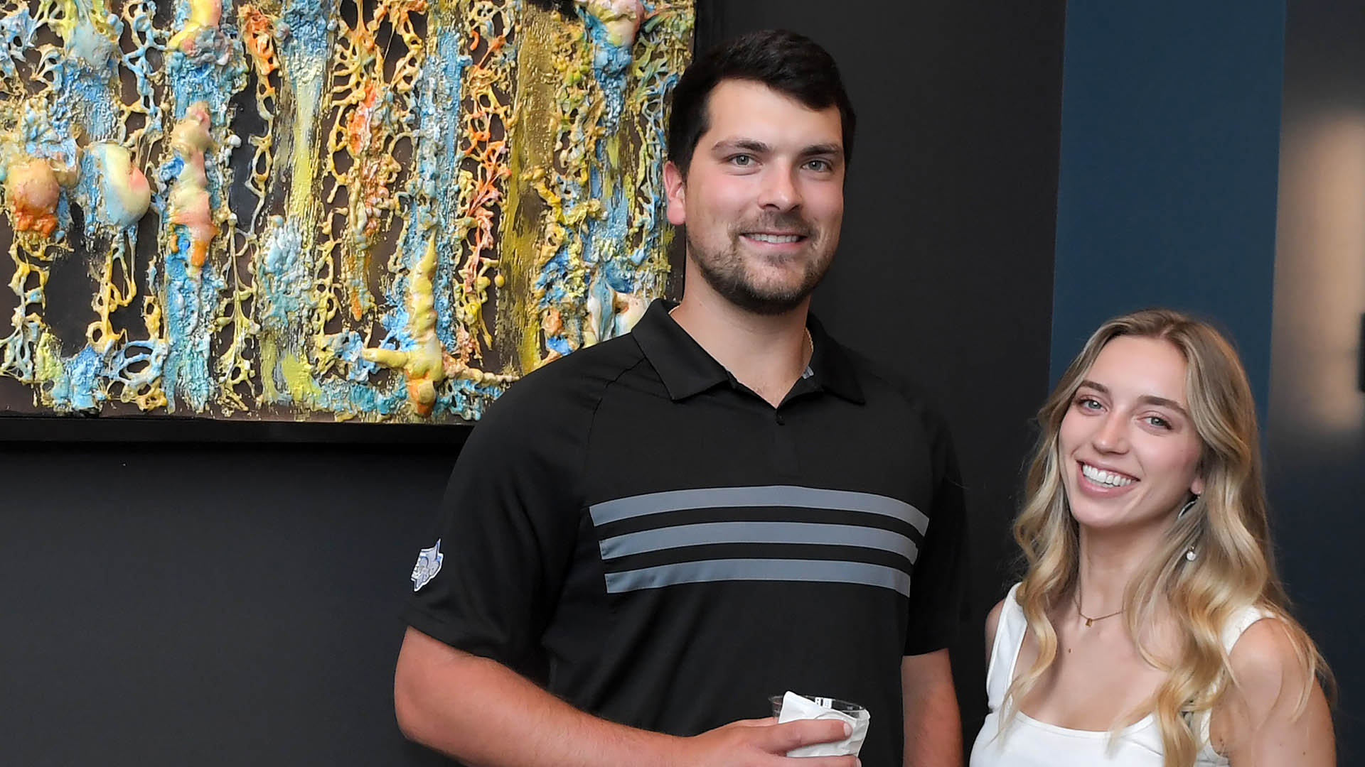 Chase Brewington and Anna Mitchum enjoy the evening. The Simpsonville Arts Center presented the Ed Cascone Art Exhibition