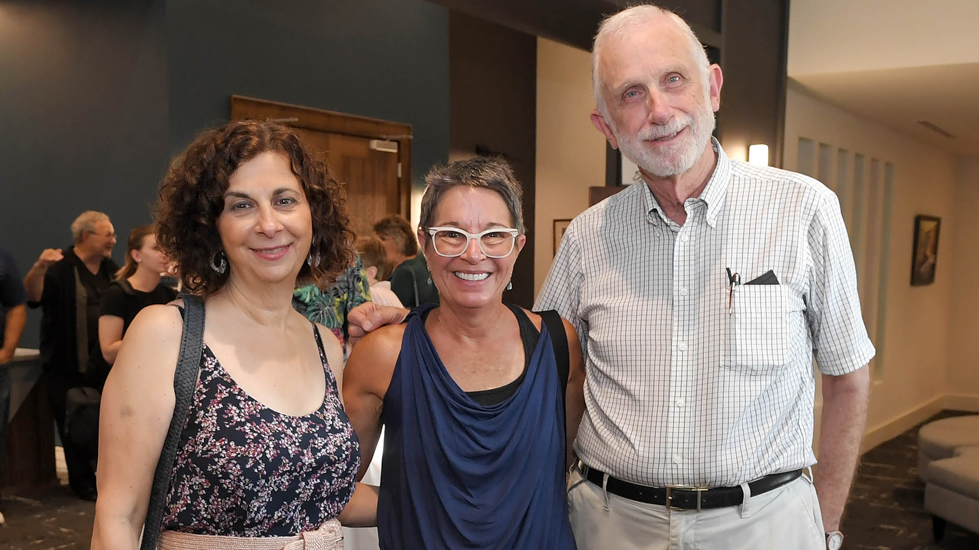 Lucille Herwald, left, Leah Narro and Robert Taylor enjoy the evening. The Simpsonville Arts Center presented the Ed Cascone Art Exhibition