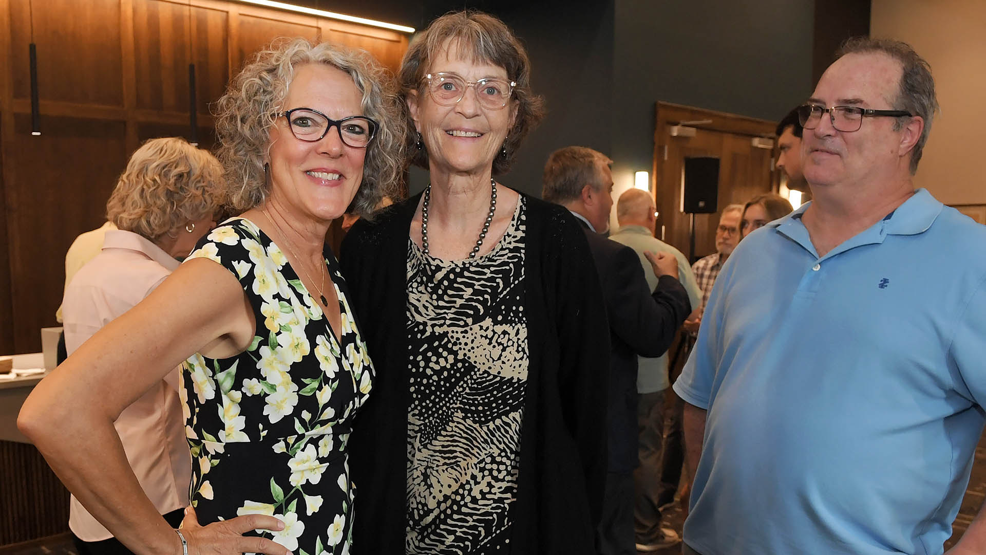 Melissa Sturgis, left, and Cynthia and Jason Steward enjoy the evening. The Simpsonville Arts Center presented the Ed Cascone Art Exhibition