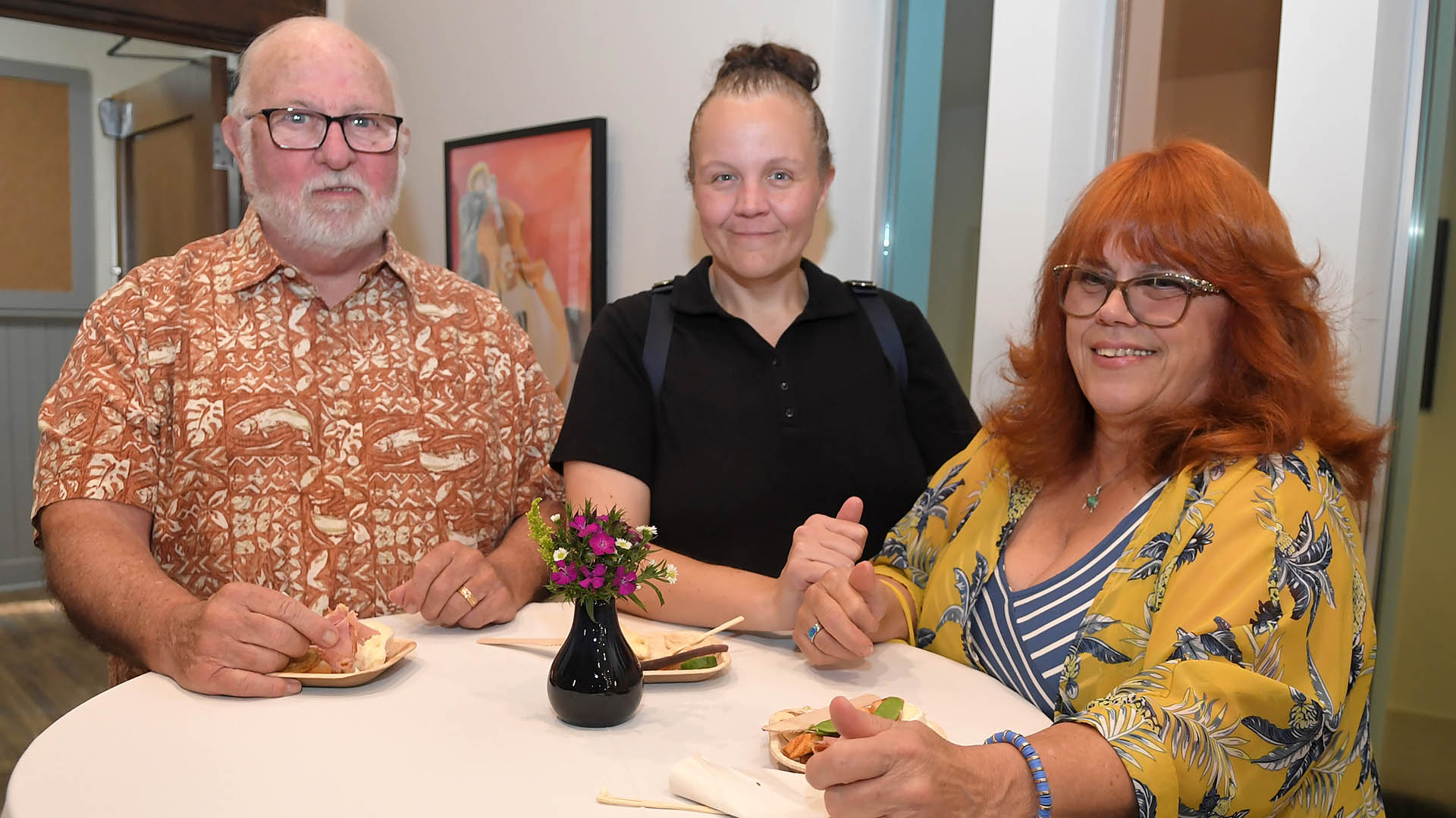 Ken Molloy, left, Allison Malloy and Debra Molloy enjoy the evening. The Simpsonville Arts Center presented the Ed Cascone Art Exhibition