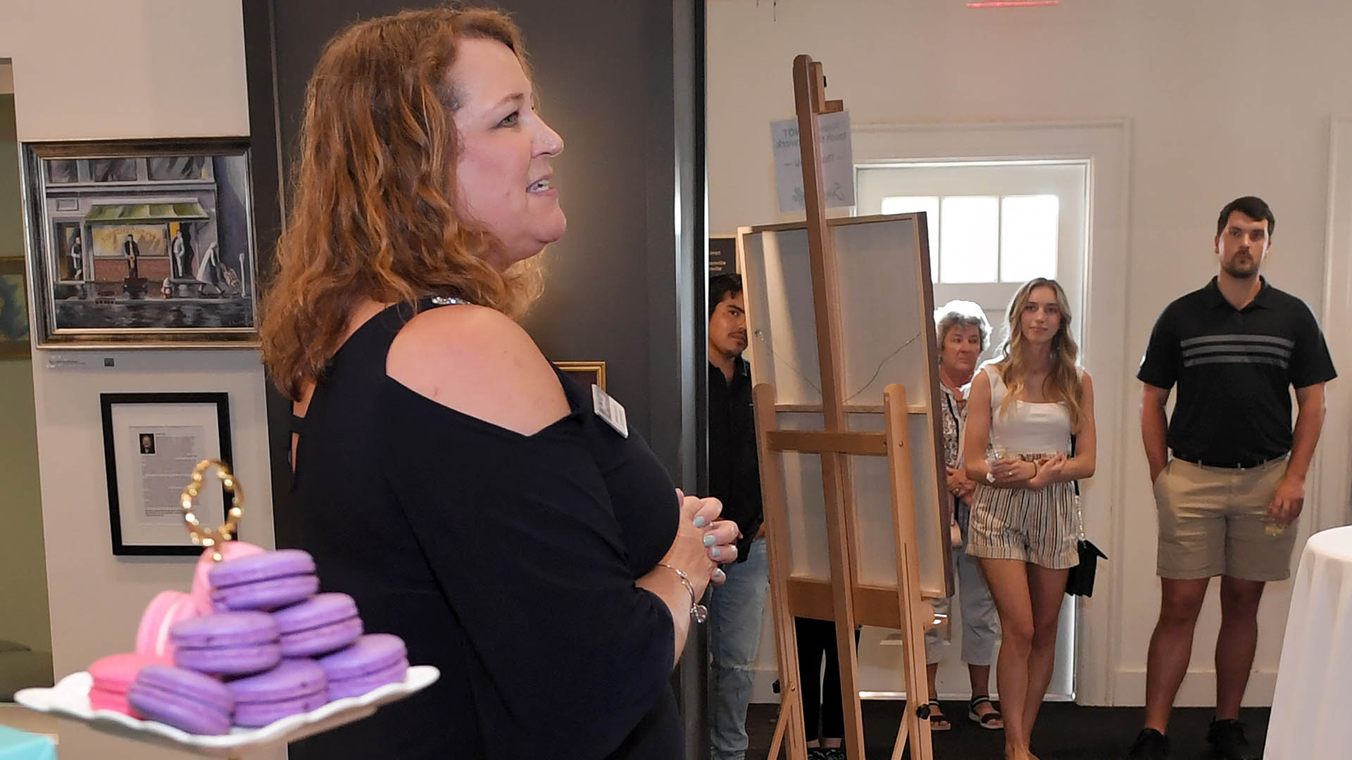 Simpsonville City Administrator Dianna Gracely welcomes guests. The Simpsonville Arts Center presented the Ed Cascone Art Exhibition