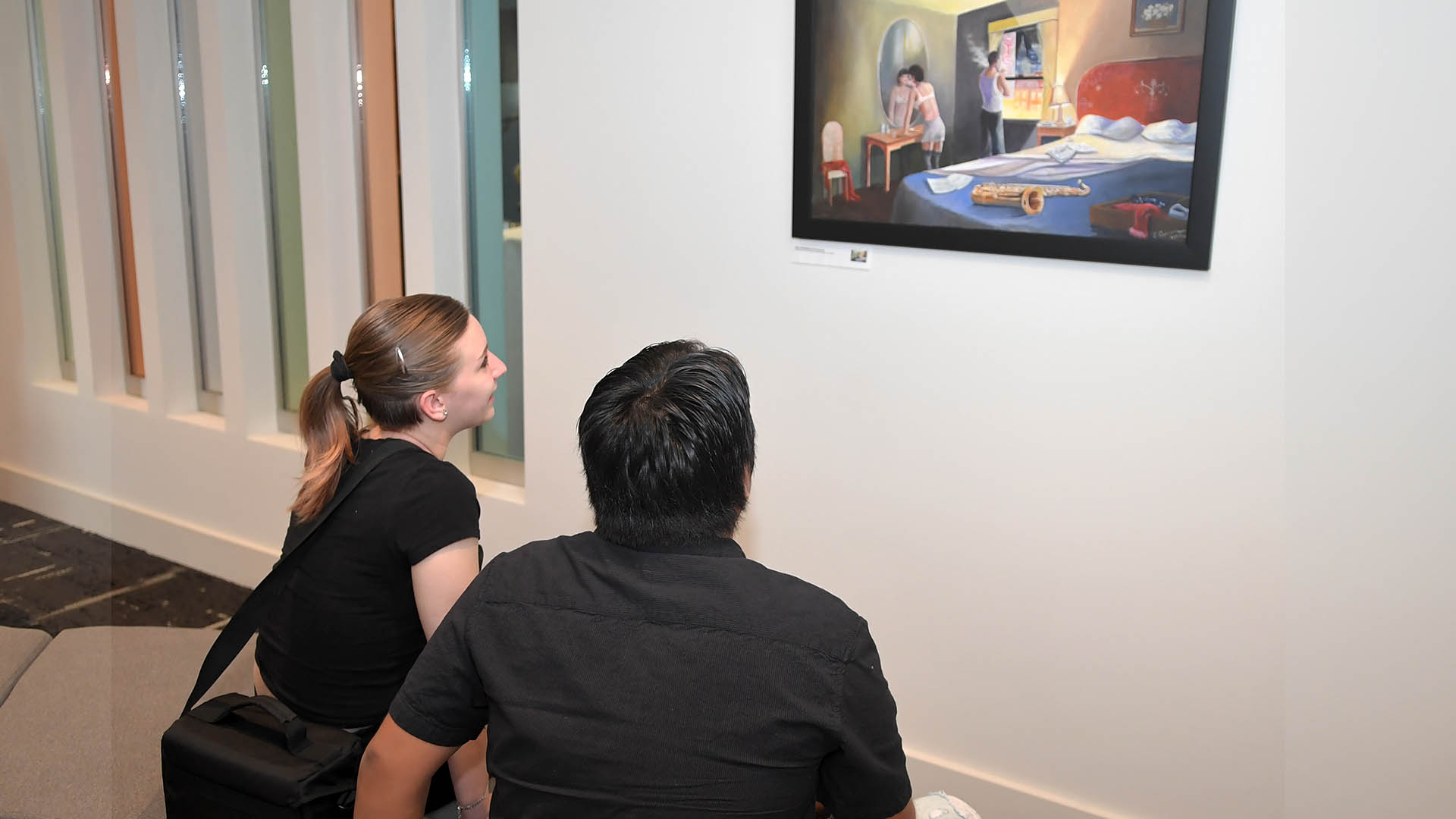 Micky Harney and Orlando Corona enjoy the evening. The Simpsonville Arts Center presented the Ed Cascone Art Exhibition