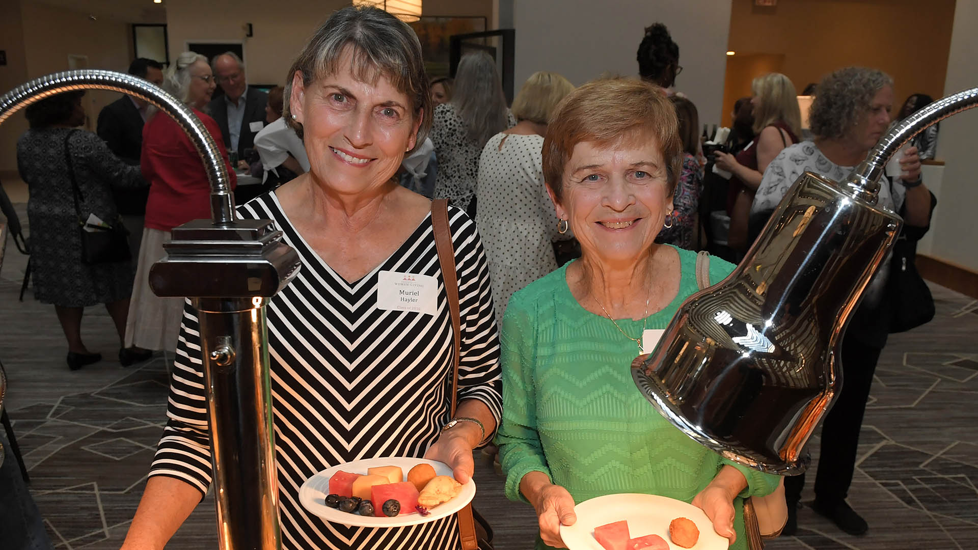 Muriel Hayler and Betsy Smith enjoy the evening. Greenville Women Giving kicked off it's 17th Season with a special Gala at the Embassy Suites Wednesday, September 14, 2022. GWINN DAVIS MEDIA