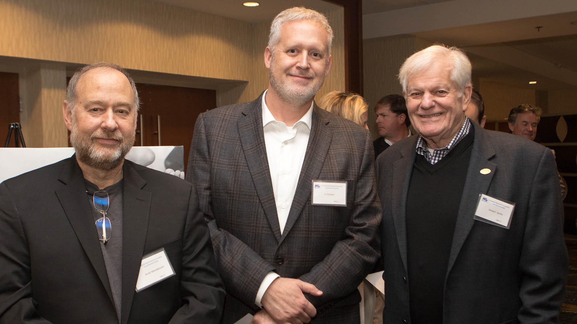 Andy Mendelsohn, JJ Puryear, and Stewart Spinks, at the 25th annual March of Dimes Real Estate & Economic Development Award luncheon at Hyatt Regency Greenville on November 14, 2022.
